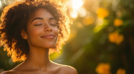 Woman with curly hair enjoying golden sunlight