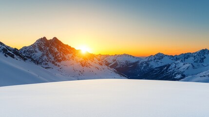 Majestic sunset over snow-capped mountains.