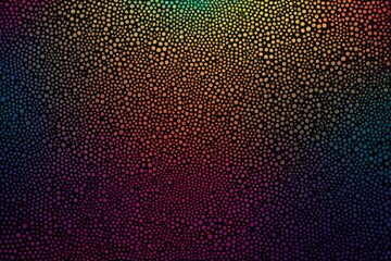 a close up of a rainbow colored background with a lot of dots