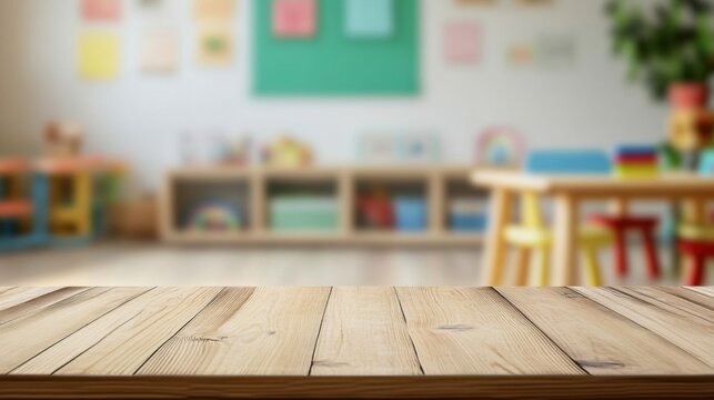a wooden table in a classroom with a colorful wall