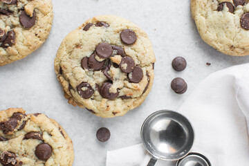 Overhead view of chocolate chip cookies on a white background, top view of homemade chocolate chip cookies