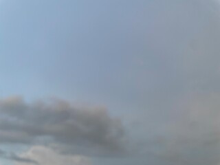 Beautiful sky with natural gradations. Thick clouds in the dusk sky on a winter night. Image of a...
