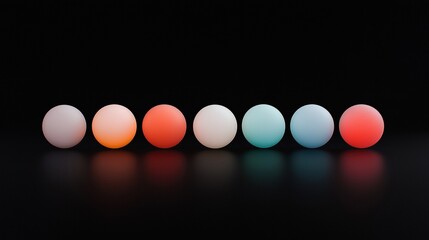A row of colorful balls are lined up on a black background