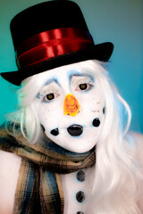 Portrait of a woman wearing artistic snowman makeup, Christmas.