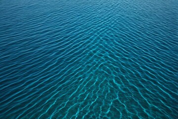 Obraz premium a close up of a body of water with a boat in the distance