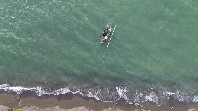 fishing boat on the beach in makassar