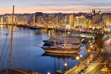 Fototapeta premium Sliema harbor View with boats at night
