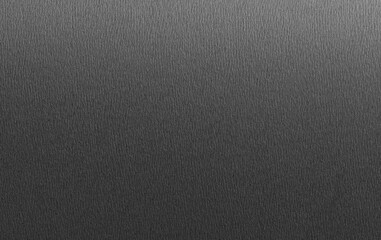 Charcoal gray paper background with a grainy matte texture and smooth surface. Dark neutral tones create a bold, refined, and sophisticated design with a seamless and versatile composition.