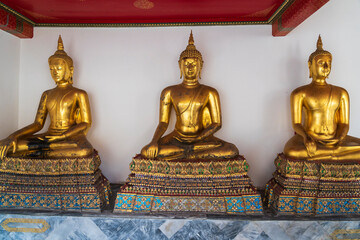 Row of buddhas at Wat Pho - The Temple of the Reclining Buddha