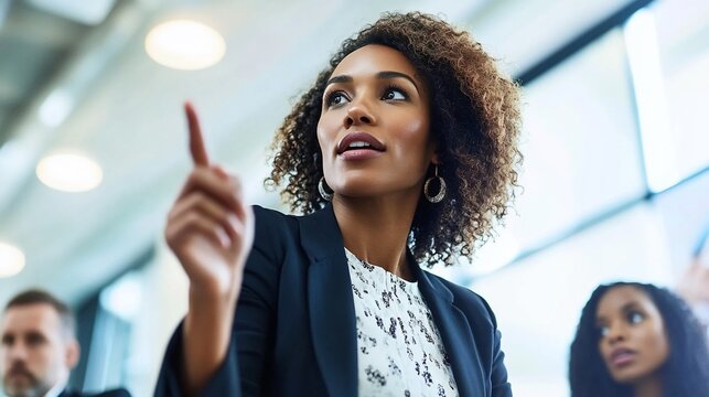 Woman participates in business meeting making a point
