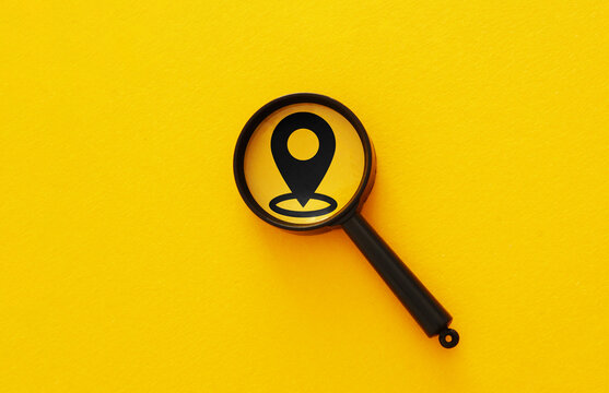 Magnifying glass over the geolocation icon To find a location. We have moved
