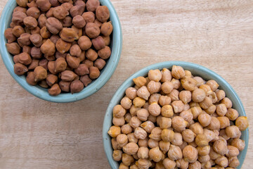 White Chickpeas and Black/Brown Chickpeas Comparison in a Bowl - Healthy Legume Variety