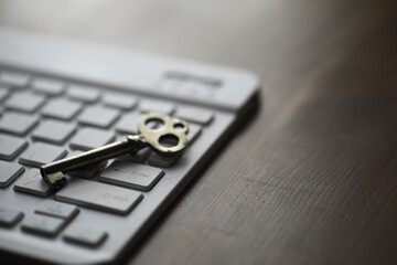 Vintage Key on Computer Keyboard: A Blend of Old and New Technology