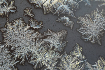 Close-Up of Delicate Frost Patterns on a Cold Winter Window