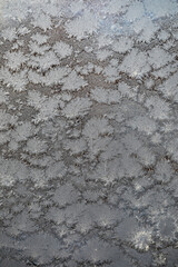 Close-up of Frost Patterns on Glass: Intricate Ice Formations, Winter, Texture, Natural Art, Cold