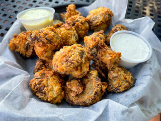 Fried Mushrooms In A Basket With Honey Mustard And Ranch Dressing Dips