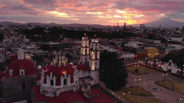 Puebla at Dramatic evening Sunset aerial drone shot of City Center in Puebla de Zaragoza, Puebla State, Mexico
