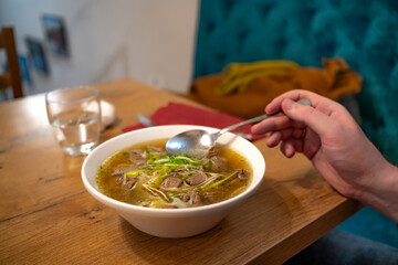 a bowl of soup. Traditional Vietnamese Phobo soup