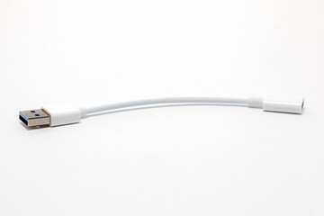 Short white cable with usb-c to usb-a connection as single usb hub