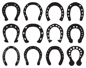 Black silhouettes of horseshoes on a white background