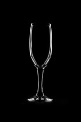 Silhouette of a glass goblet on a black background