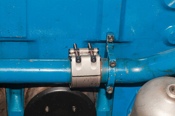 Connecting steel pipes on a marine diesel generator.