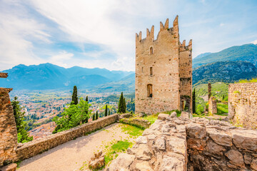 Arco castle ruins on cliffs above Garda lake, Trentino, Italy. Lago di garda