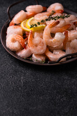 Frozen uncooked prawns or shrimps with lemon