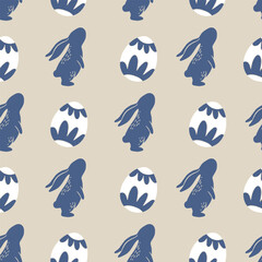 Seamless pattern with rabbits and decorative Easter eggs. Spring and Easter celebration design. Design for wallpaper, textile, poster, and greeting card.
