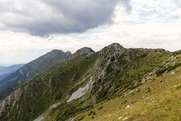 Hiking trail heads up a steep mountain ridge