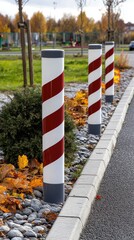 Open parking barrier gate stands in a residential area, surrounded by autumn trees and a quiet parking lot in a minimalist style.