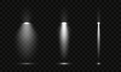 A set of white spotlight effects on a dark background. Collection of vector flares. White glare. Vector illustration EPS10