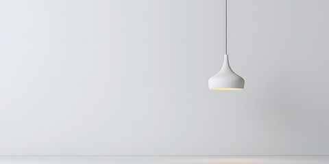 Modern minimalist pendant light against a white wall. Simple, clean design perfect for contemporary interiors.