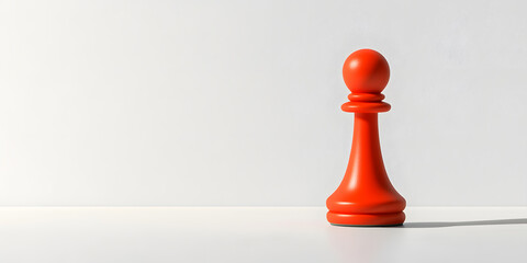 Single orange chess pawn on a white surface.  Clean, minimal background.  Concept of strategy, beginnings, or a single player.