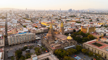 Guadalajara cathedral dominating downtown skyline during golden sunset. Jalisco State, Mexico