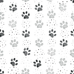 Grey and black paw prints with dots seamless pattern
