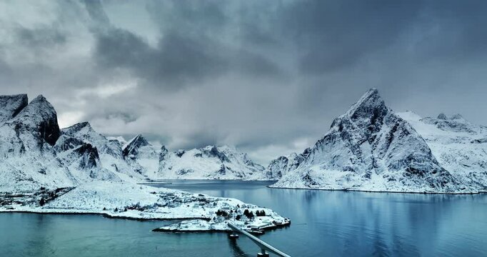 Bridge Fredvang and village, Flakstad, Lofoten islands, Norway arctic winter landscape aerial panorama