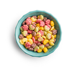Colorful breakfast cereals in the shape of various fruit in bowl isolated on white background.