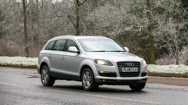 Milton Keynes,UK - Jan 12th 2025:   2008 Audi Q7 diesel engine suv  car driving on a cold,frosty morning