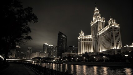 Fototapeta premium Silhouette of Luxury Hotel at Night - Dramatic Cityscape