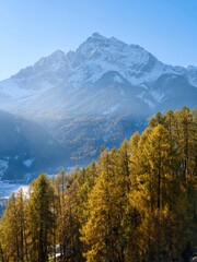 Mount Serles backlighted. Autumn at the Telfer Wiesen in the valley Stubai. Austria, Tyrol