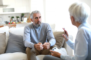 psychotherapy discussion patient advice support therapy session man senior help psychologist doctor...