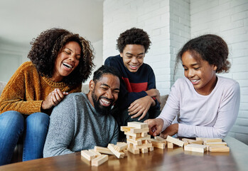 child family fun toy game mother playing block girl wooden education father learning toy block home daughter boy woman tower together creativity bonding