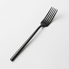 A sleek black fork with a matte finish angled on a white background, showcasing a bold and elegant design for modern dining
