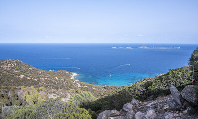 Aerial view of the small beaches on the coast of Castiadas in Sardinia with transparent, blue and turquoise water