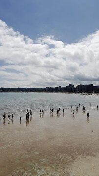 Playa Gijon, verano, calor, beach, people, vertical shot 