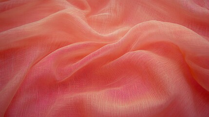 Obraz premium Draped Coral Pink Sheer Fabric Texture Background