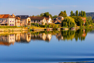 Beachfront homes situated on the Seine River in Normandy.