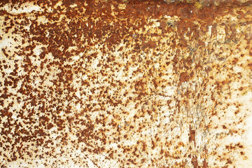 Rusty metal texture. Corrosion background. White peeling paint. Grunge rust on metal. Cracked paint pattern.