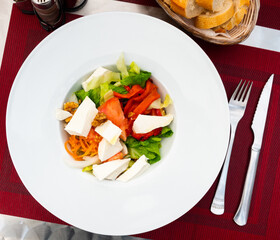 Spanish cuisine, salad Ensalada queso fresco y nueces, fresh cheese and walnut salad in a restaurant